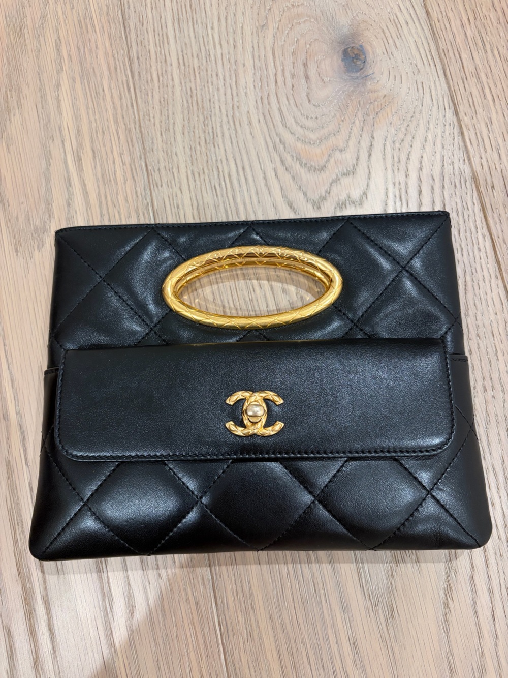 CHANEL Black Quilted Leather Envelope Clutch with Gold Oval Handle Strap